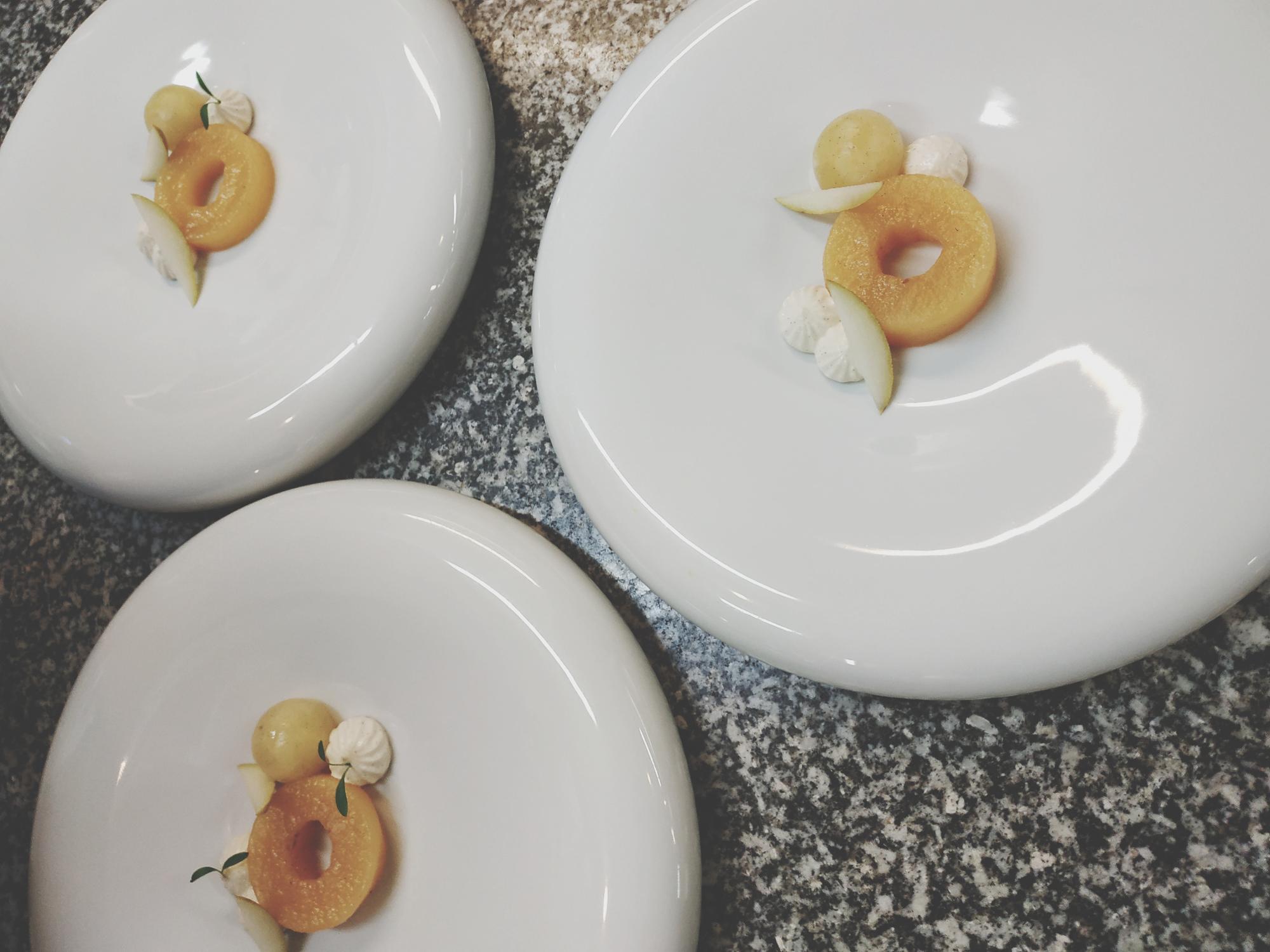 Three plated dishes arranged in a row
